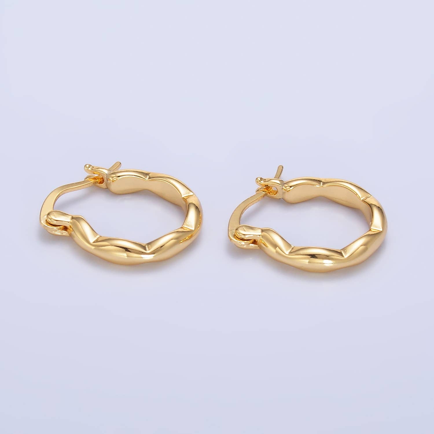 Twisted Gold Hoop Earrings – Modern Chunky Style