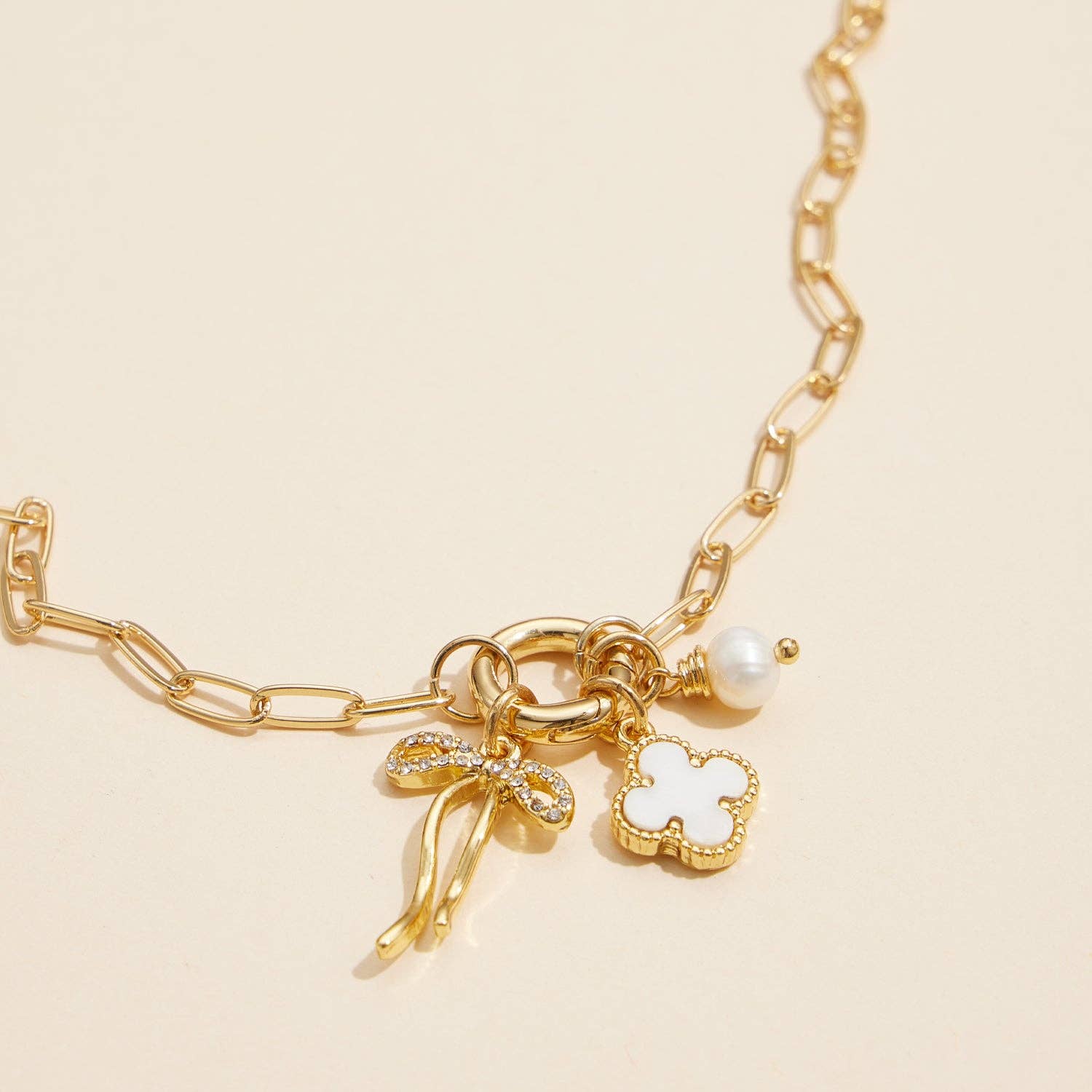 Gold Dipped Bow Charm Necklace